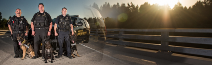 photo of three Newberg Dundee Police and K9 officers