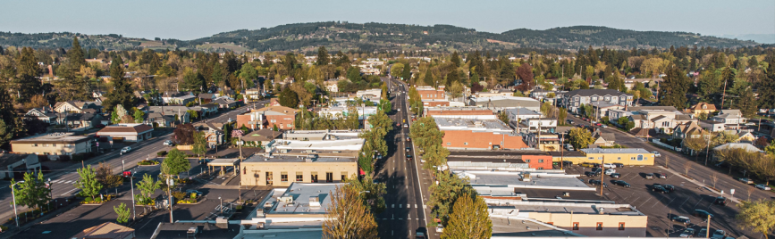 aerial image of downtown newberg with hills in background