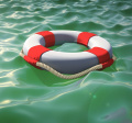 image of lifebelt floating on water. 