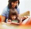woman reading to an excited child