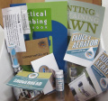 A water efficiency kit including things like pamphlets and a shower head