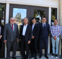 Representatives from Newberg and Consular Office of Japan pose in front of City Hall