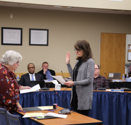 Councilor Peggy Kilburg swears the oath of office