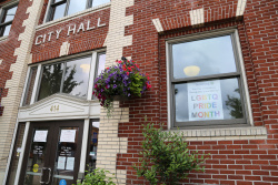 City Hall with a pride poster