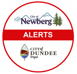 Circle with City of Newberg logo and City of Dundee logo with text reading "Alerts" 