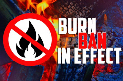 An icon depicting flames behind a red circle with a slash through it is next to text that says Burn Ban in Effect