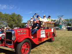 Photo of an old-school fire truck at the Newberg Old Fashion Festival 