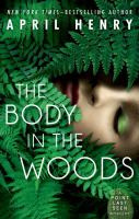 book cover for the body in the woods