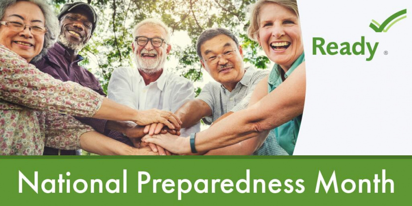 National Preparedness Month - image features several older individuals standing in a circle with their hands piled in the center